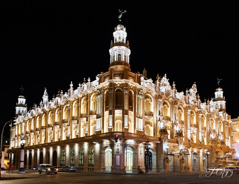 The ornate Gran Teatro de La Habana lit up at night on Parque Central
